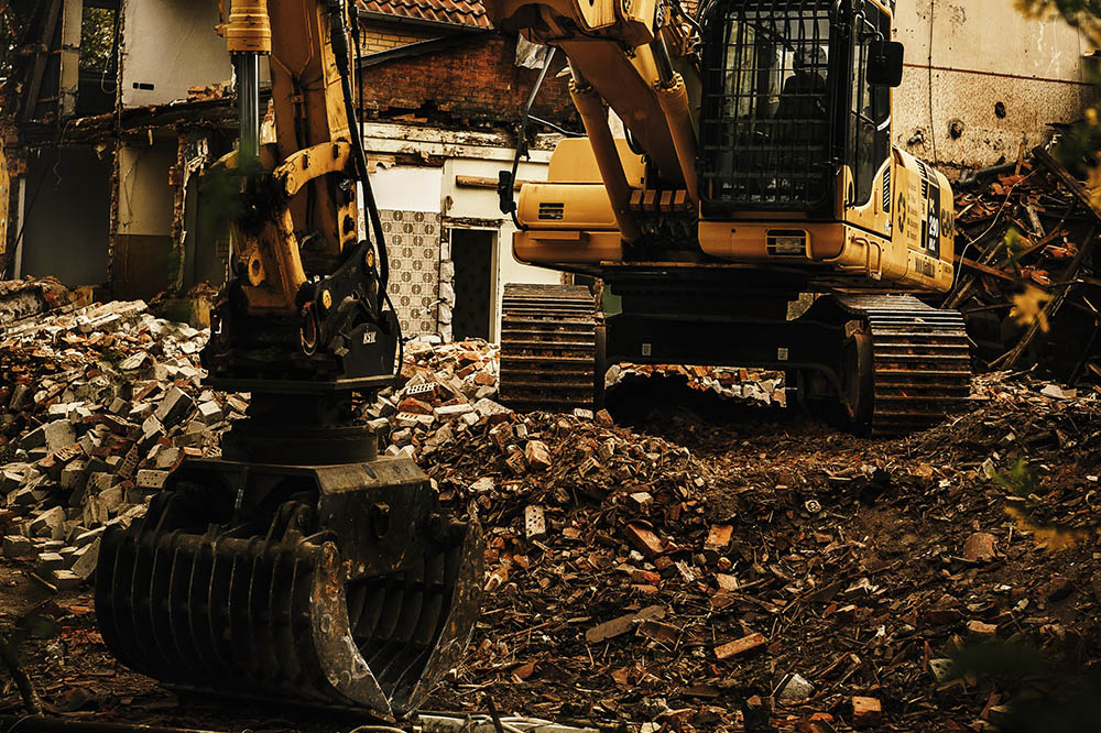 Como calcular o volume de entulho gerado na demolição de uma parede de alvenaria 